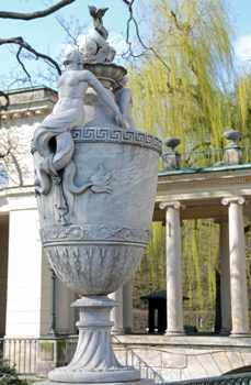 This statue, located in the garden at Warsaw's Classical Palace on the water (at the city's Lazienski Gardens), features a Mermaid, the city's symbol.  Photo by Kriss Szkurlatowski. 